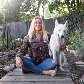 Local photographer Persia Nelson needed new photos for her website. We were going for a more natural look for this shoot, so we shot inside among the many framed photographs of her three children, and outside among her plants and animals. Her dog Tuesday decided to join us for a few shots. Photographer Persia Nelson